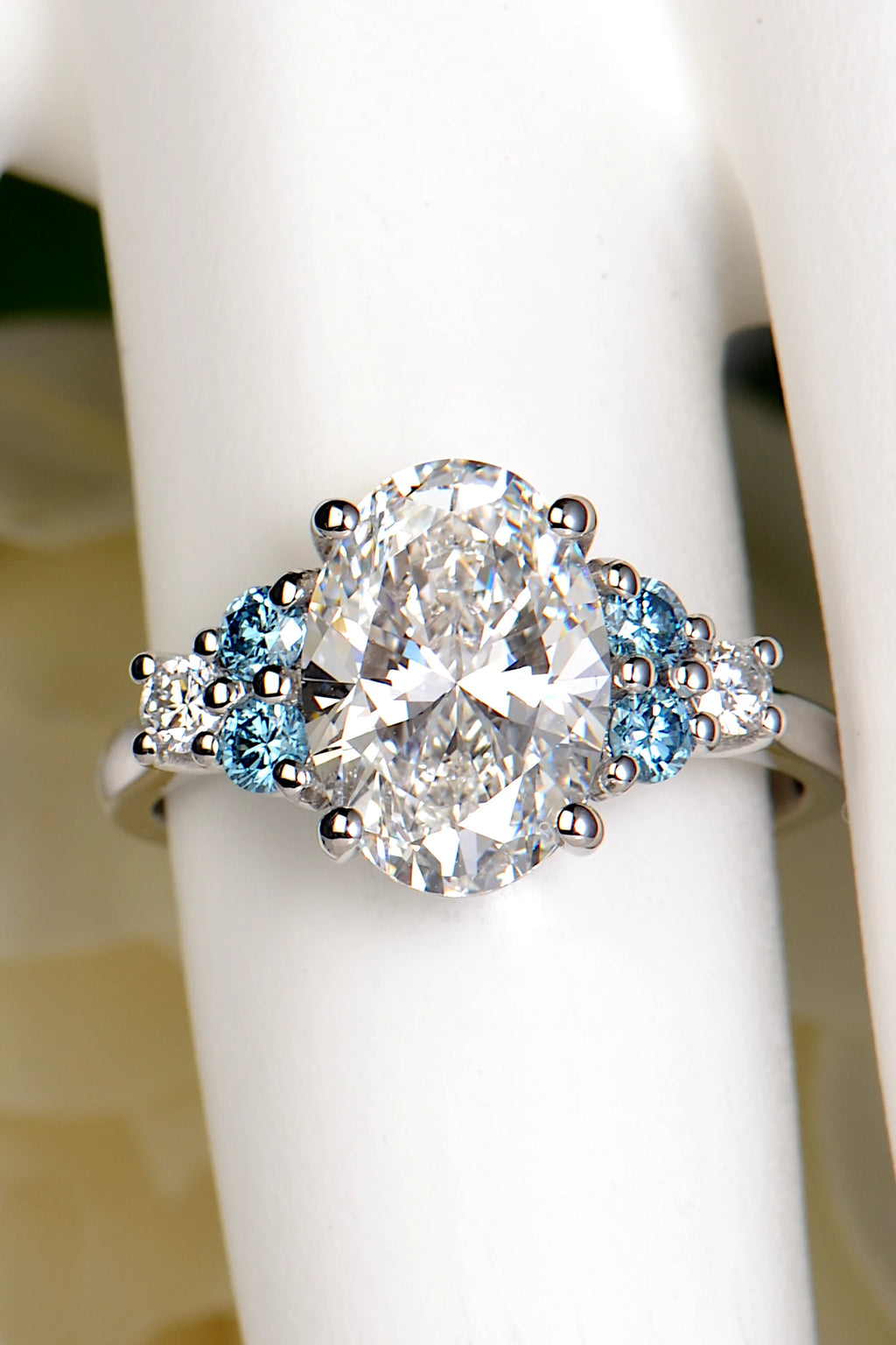 Blue Sky Spark oval lab diamond ring worn on the hand, showing the scale of the 3.09ct centre stone