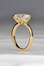 3ct oval lab grown diamond engagement ring in 18ct yellow gold showing the elegant four clau setting - Christine Sadler