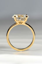 gold engagement ring 3ct oval cut lab diamond side view showing the four claw east west setting - Christine Sadler