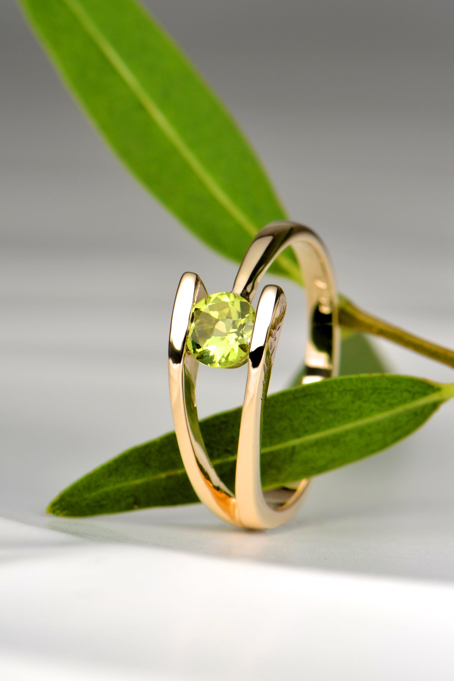 peridot gold ring made for a golden wedding ring with an olive theme - christine sadler