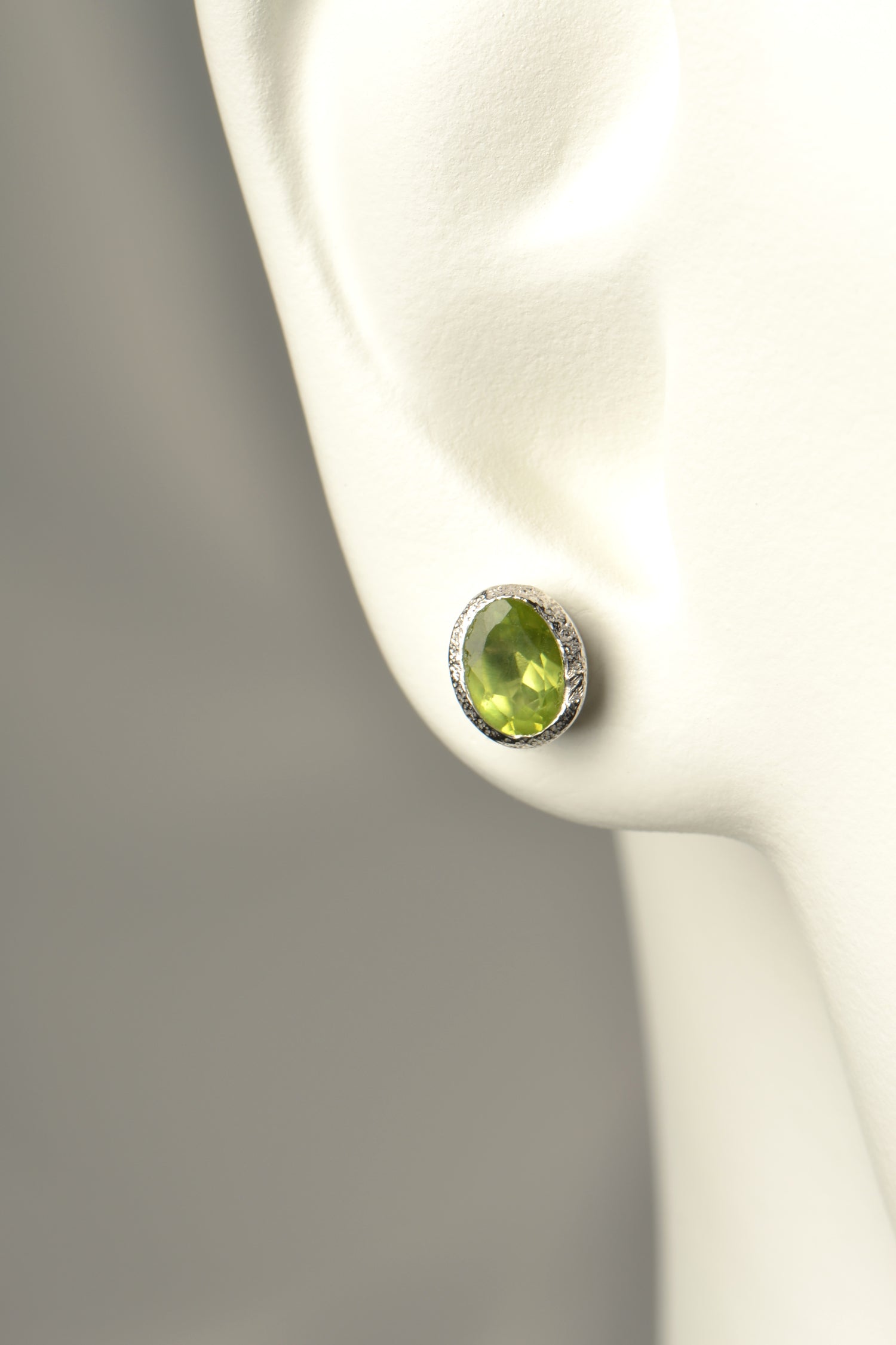 oval peridot and silver birthstone earrings