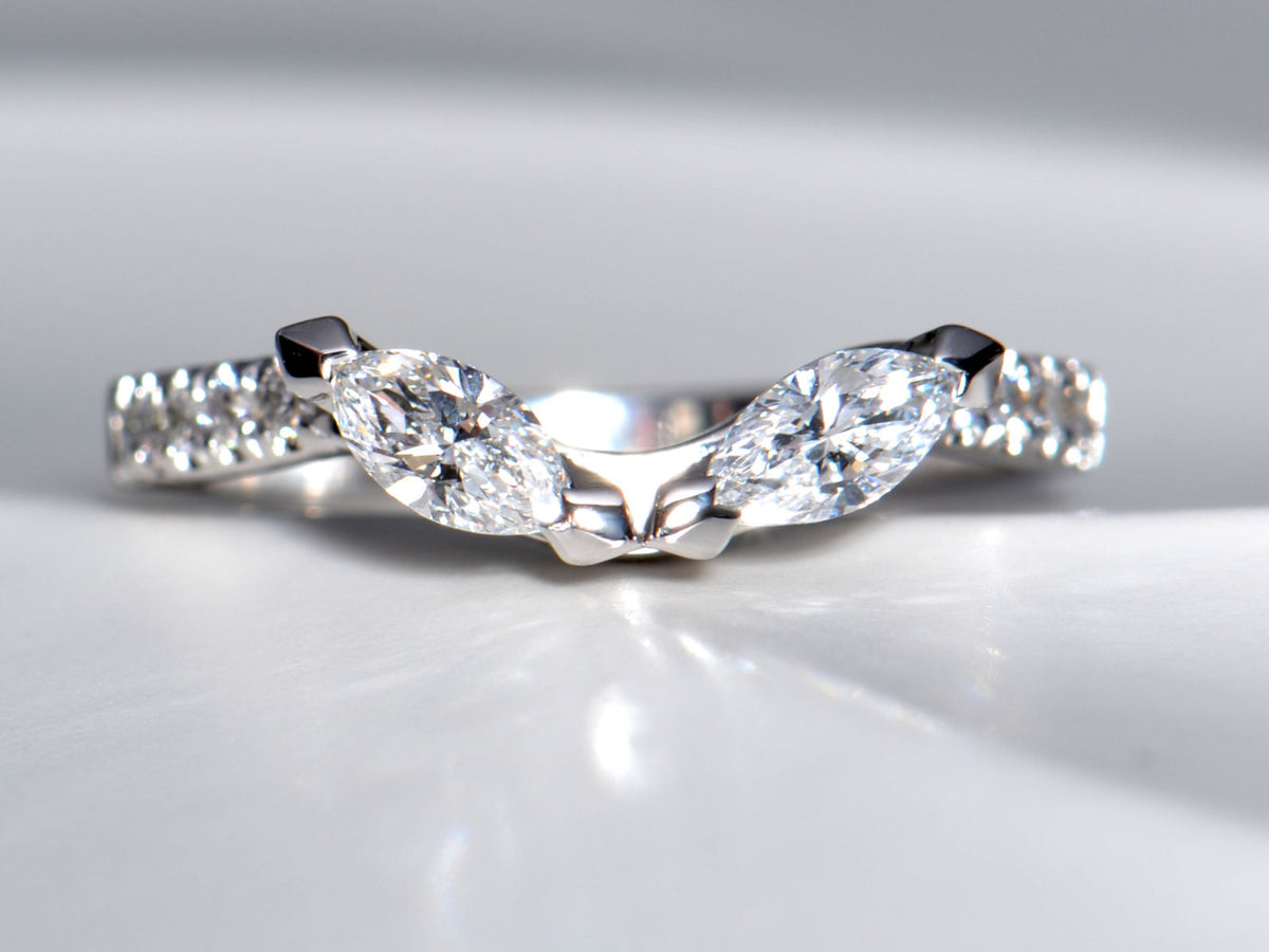 One-of-a-kind platinum and diamond shaped band with two larger marquise diamonds at the front and diamonds set in the band - Christine Sadler