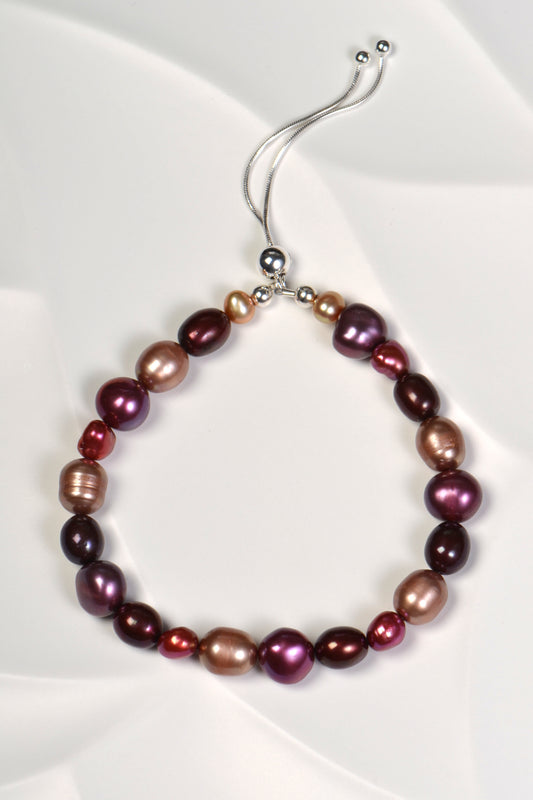 multicoloured real pearl bracelet in red, purple and pale brown