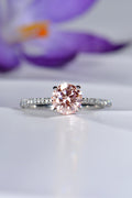 modern engagement ring design set with a one carat pink lab diamond and diamond in the shoulders - Christine Sadler
