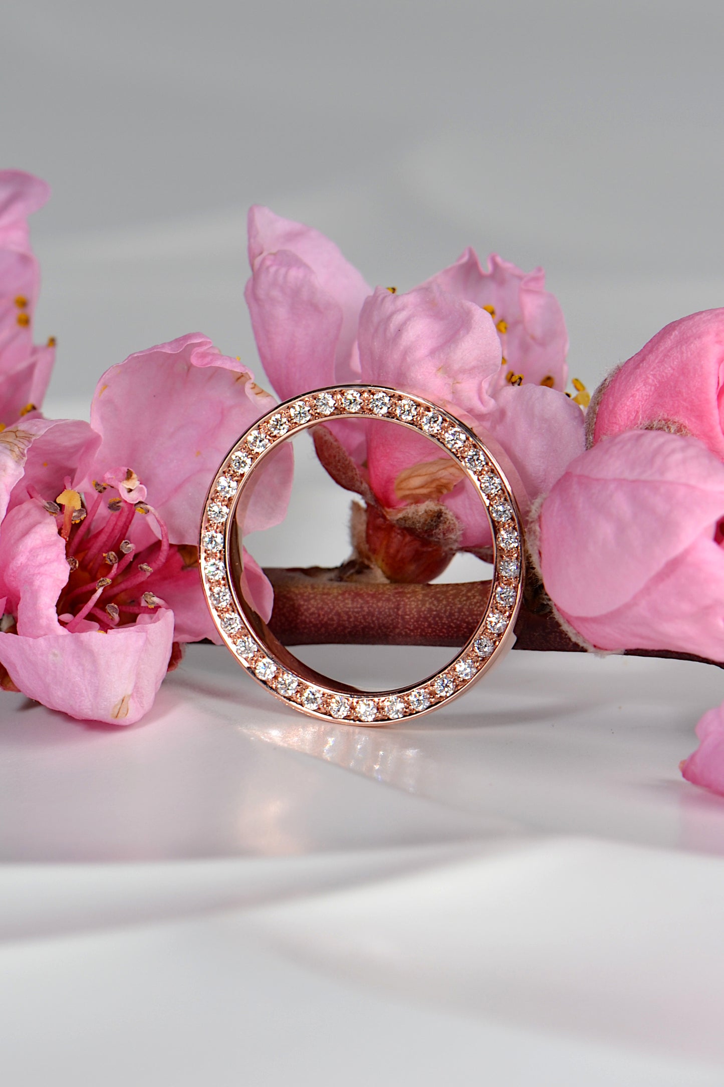 stunning halo designer diamond wedding ring in rose gold that is different and special