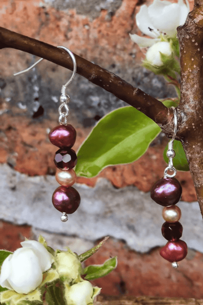 handmade real cultured pearl drop earrings in plum, pink and golden with a faceted garnet