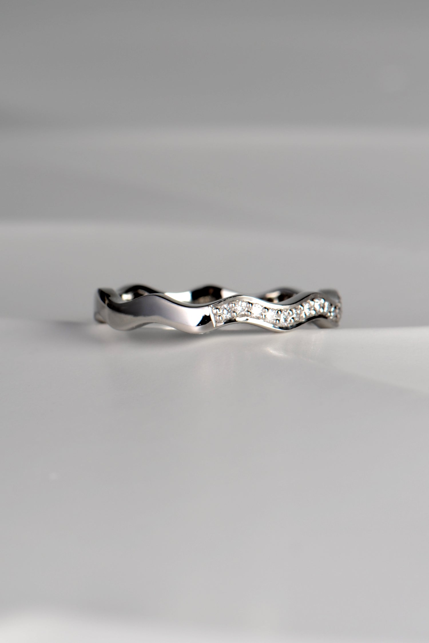 contemporary stacking wavy diamond ring in platinum