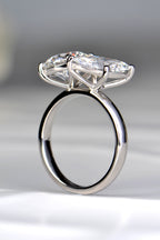 Three-quarter perspective of a handcrafted two-stone lab diamond ring showcasing the continuous uniform depth of the platinum shank by Christine Sadler