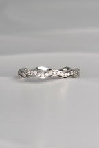 narrow platinum diamond set wavy ring made in the UK