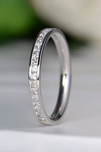 Platinum flat court half eternity ring with 17 channel set princess cut diamonds totalling 0.50ct - Christine Sadler