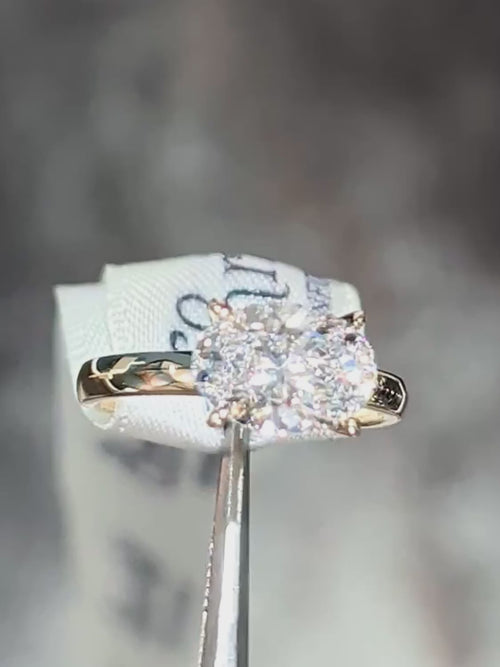 2ct oval lab rown diamond ring in an east west design in 18ct yellow gold showing the incredible sparkle from this IGI certificated gemstone.