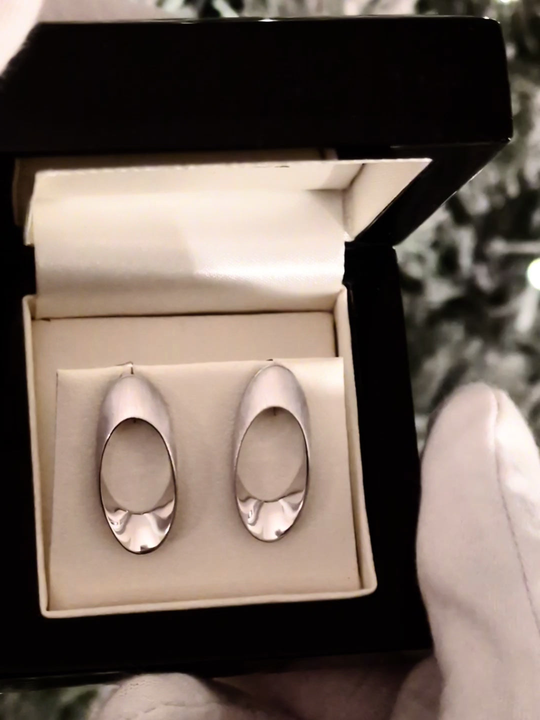modern silver large stud earrings by jewellery designer Jorge Revilla