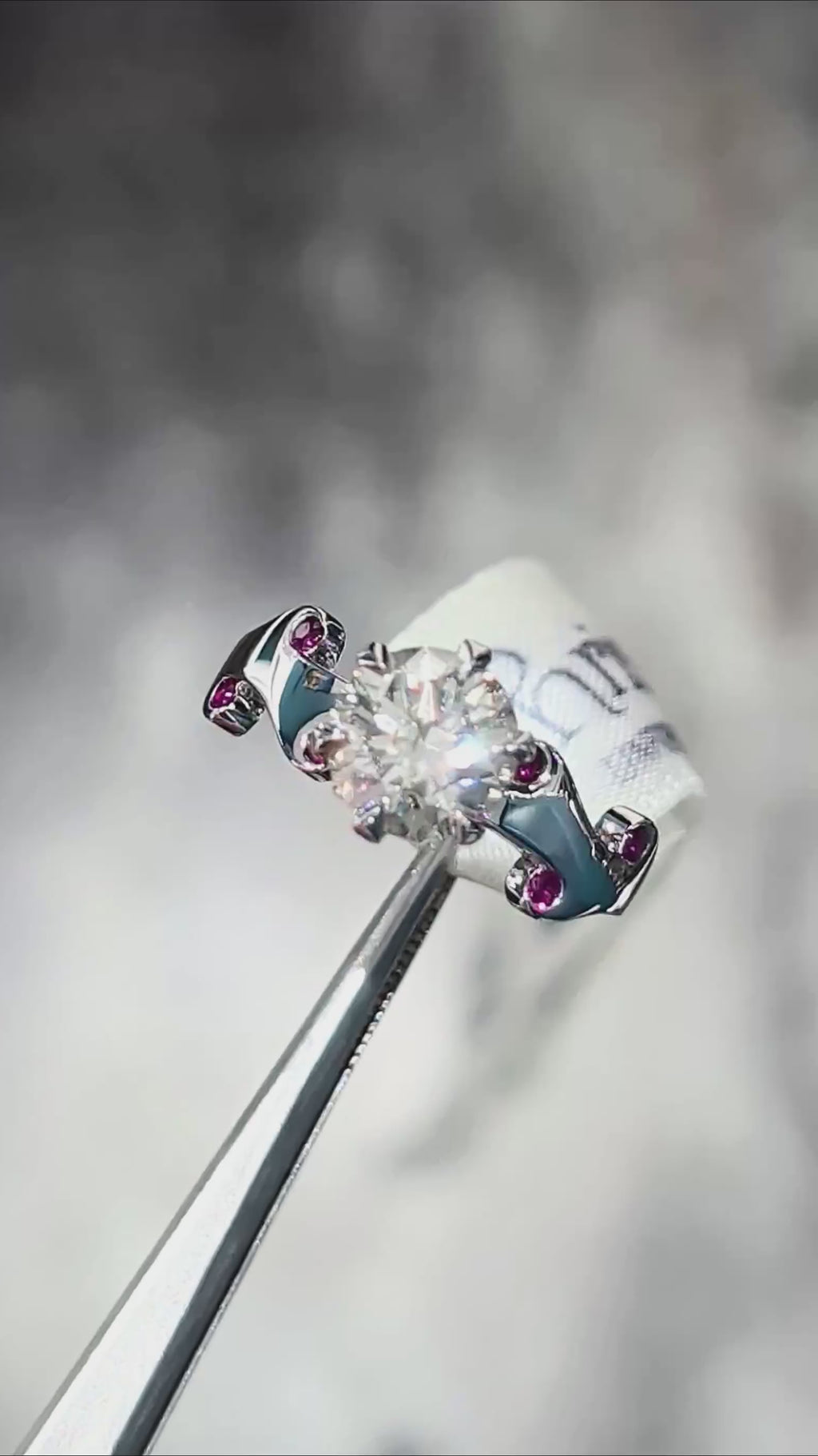 two carat platinum engagement ring with ruby accents from luxury jewellery designer Christine Sadler