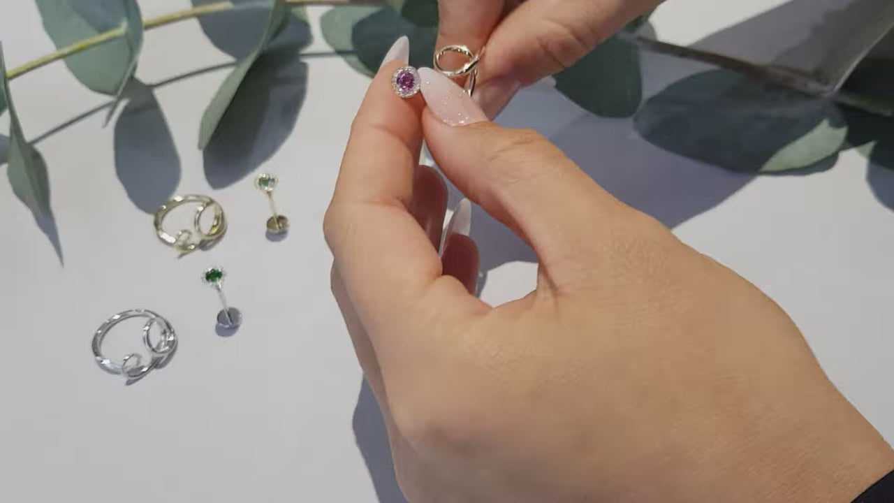Unique gold and diamond cocktail ring design that is copyrighted that allows the wearer to change the gemstones - designer Christine Sadler