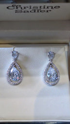 Pear-Cut Cubic Zirconia Halo Drop Earrings in Sterling Silver