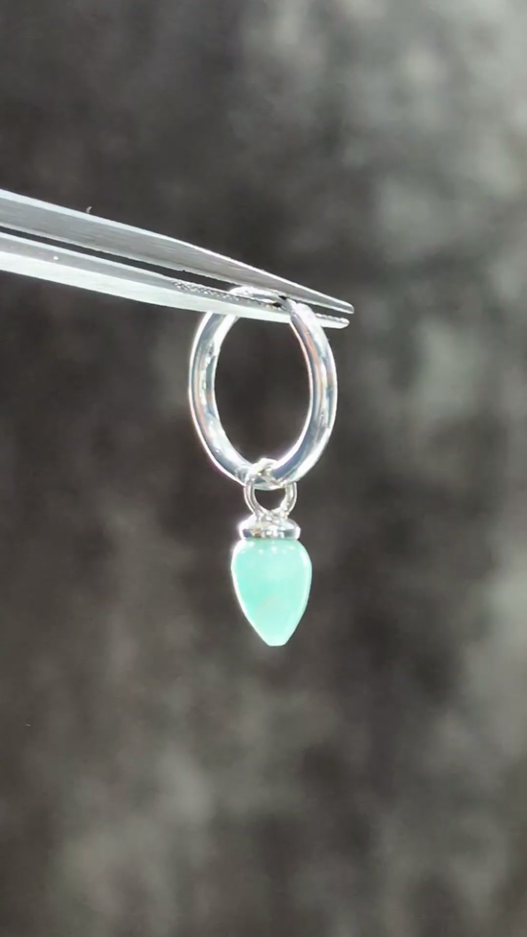 Sterling silver and amazonite convertible hoop earrings being taken apart and styled in four different ways with removable real gemstones.