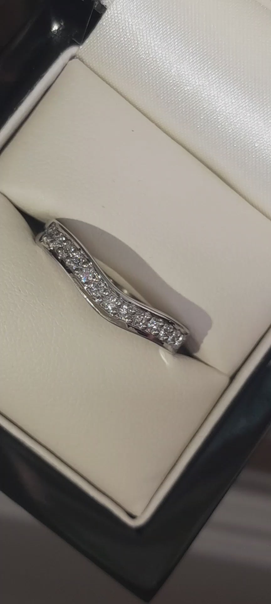 video of U shaped Platinum and diamond wedding or eternity ring