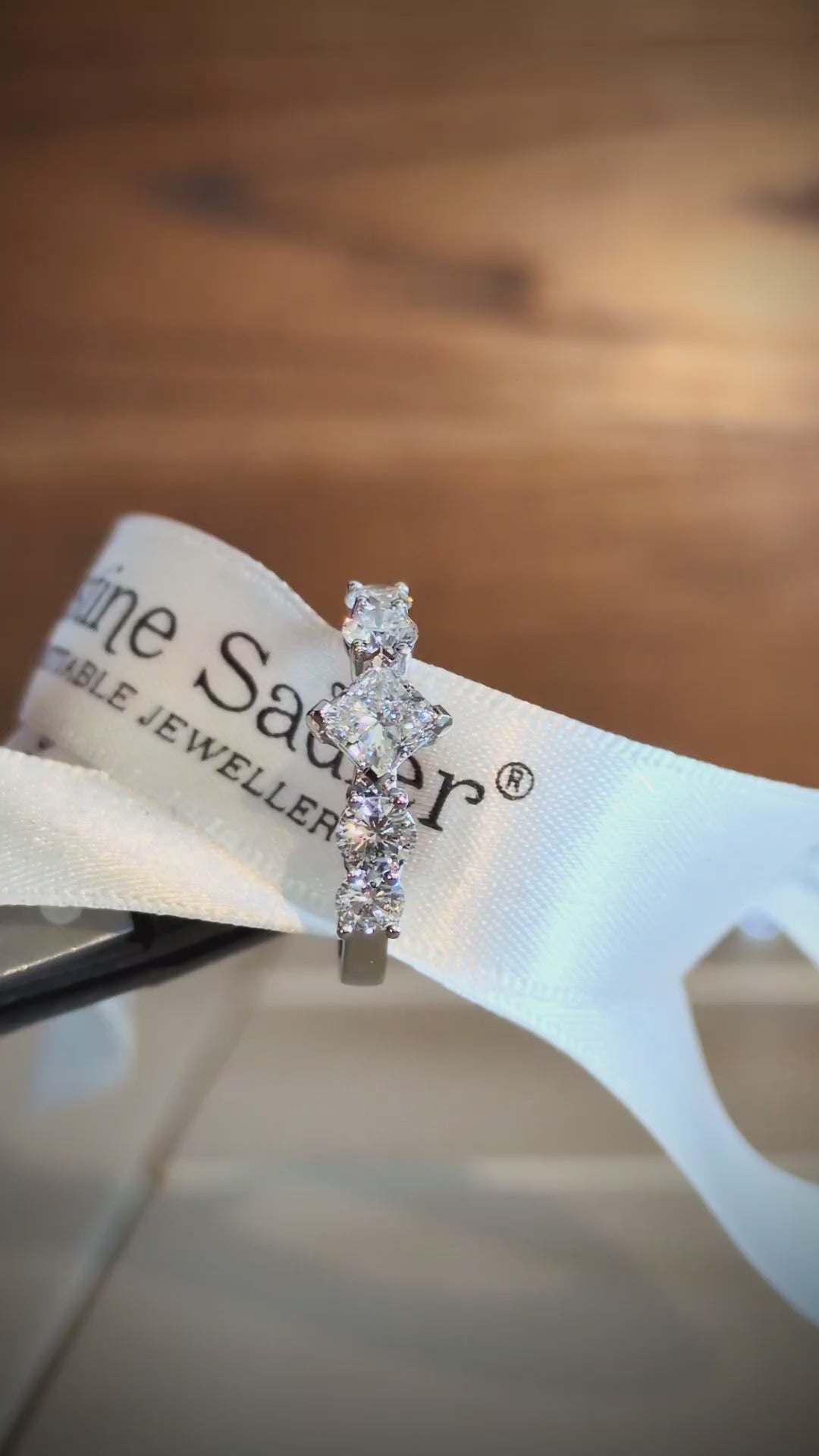 Remodelled platinum and diamond five stone engagement ring with a princess cut diamond and four round diamonds - Christine Sadler