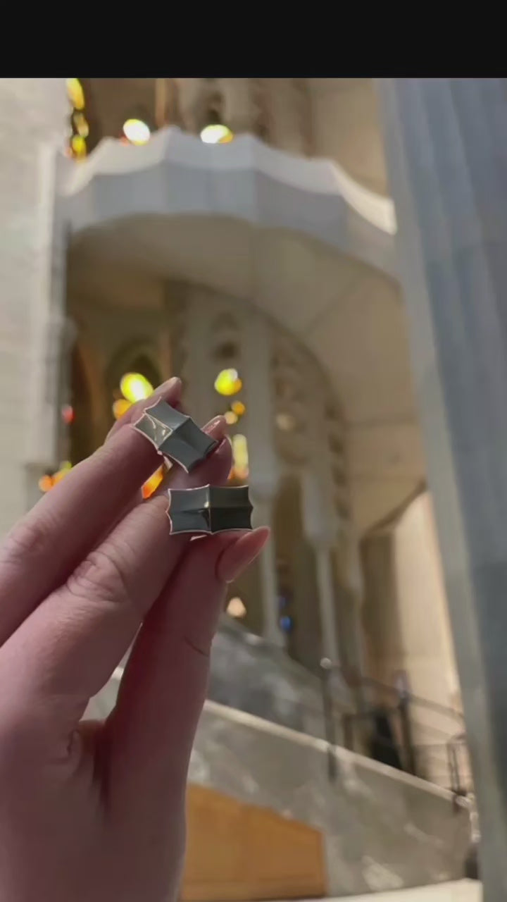 The Sagrade ring, wedding ring and cufflinks in the Sagrada Familia church showing the exact location that inspired the one-of-a-kind jewellery pieces from Christine Sadler