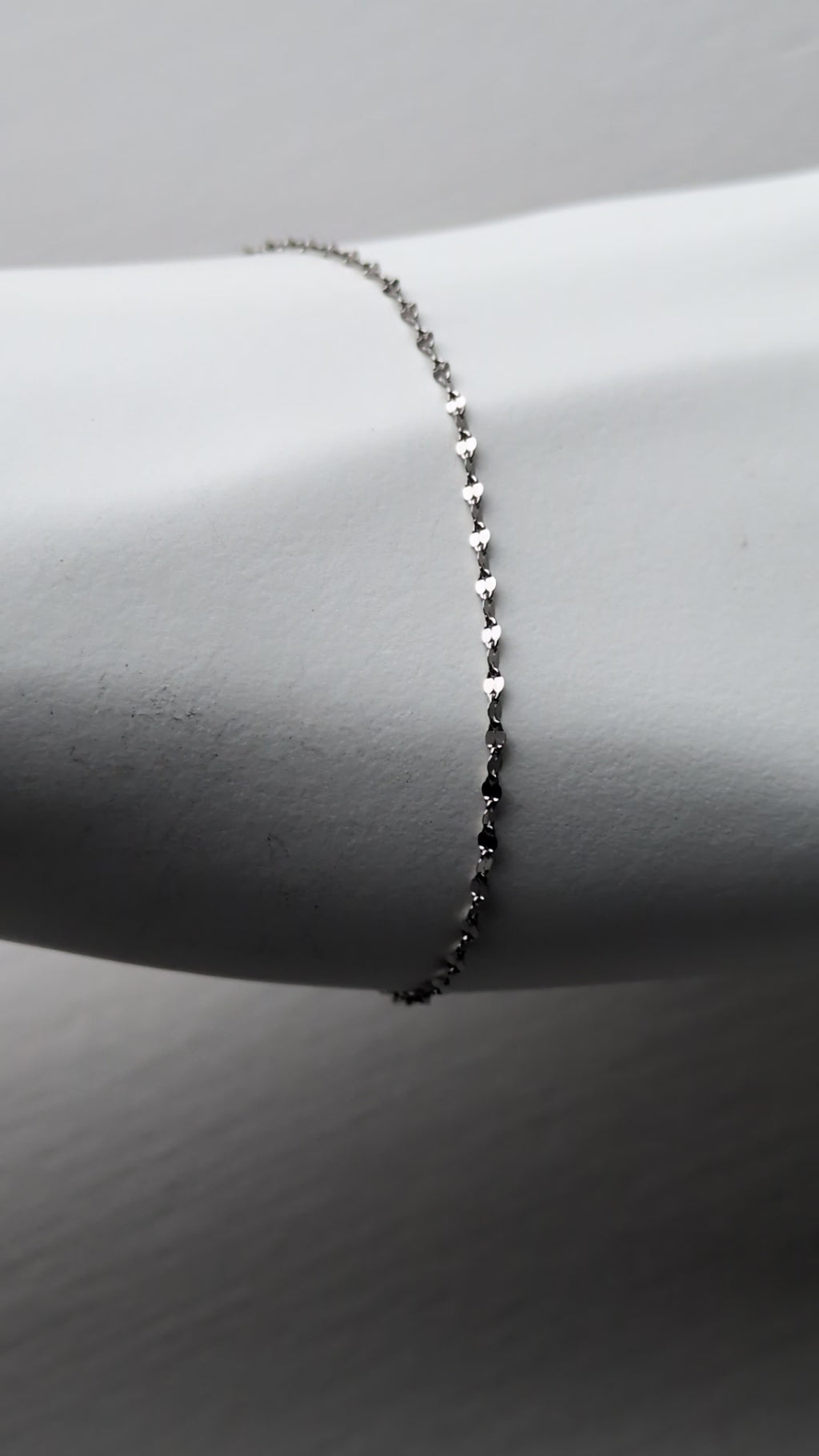 video of delicate platinum bracelet that sparkles