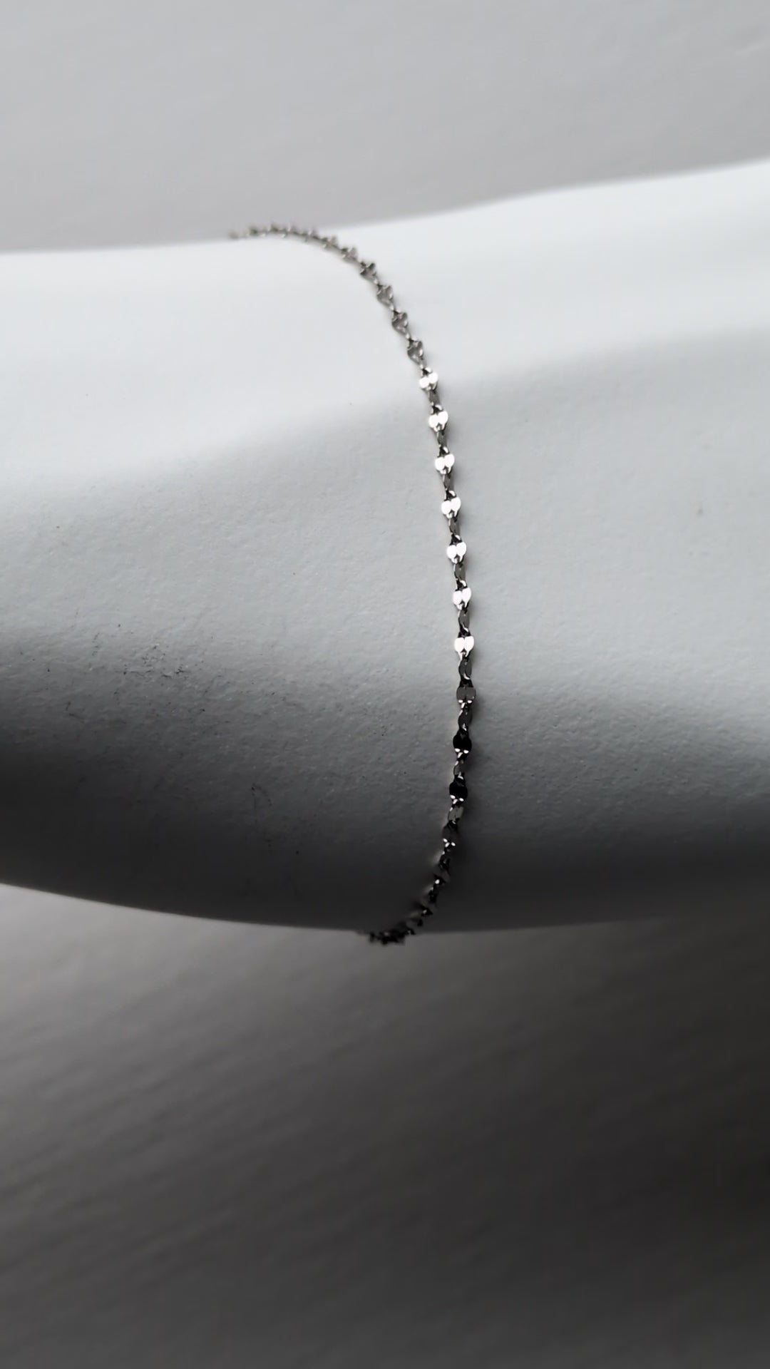 video of delicate platinum bracelet that sparkles
