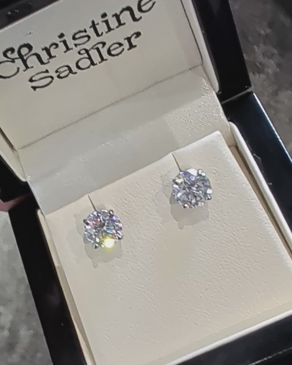 A pair of 18ct white gold moissanite stud earrings, 2ct in total, 1ct in each earring. 