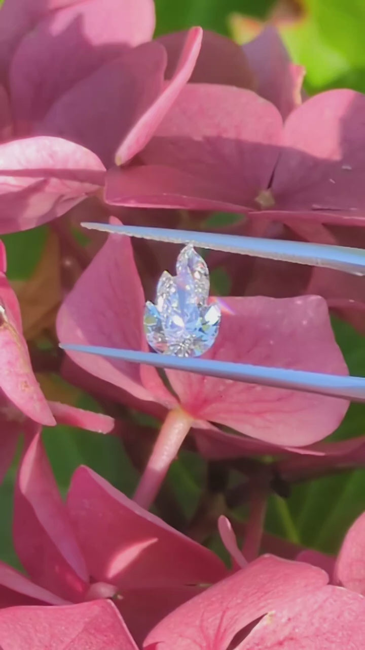 Large lab diamonds cut into the shape of flames and made into earrings - Christine Sadler Ayr