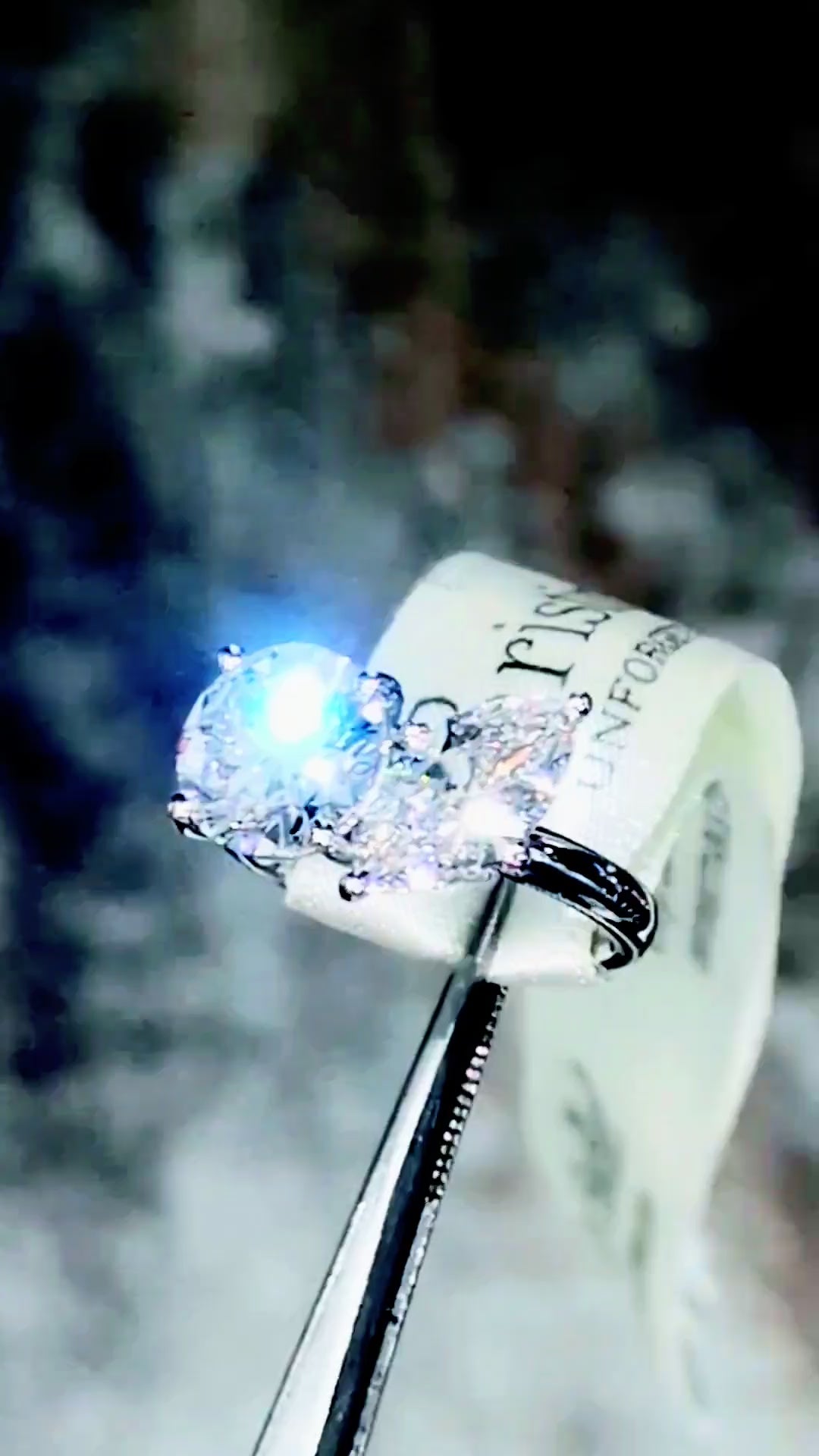Video showcasing the fire and sparkle of a 3.05 carat round and 1.54 carat marquise cut D color lab diamond Toi et Moi ring from multiple angles by Christine Sadler