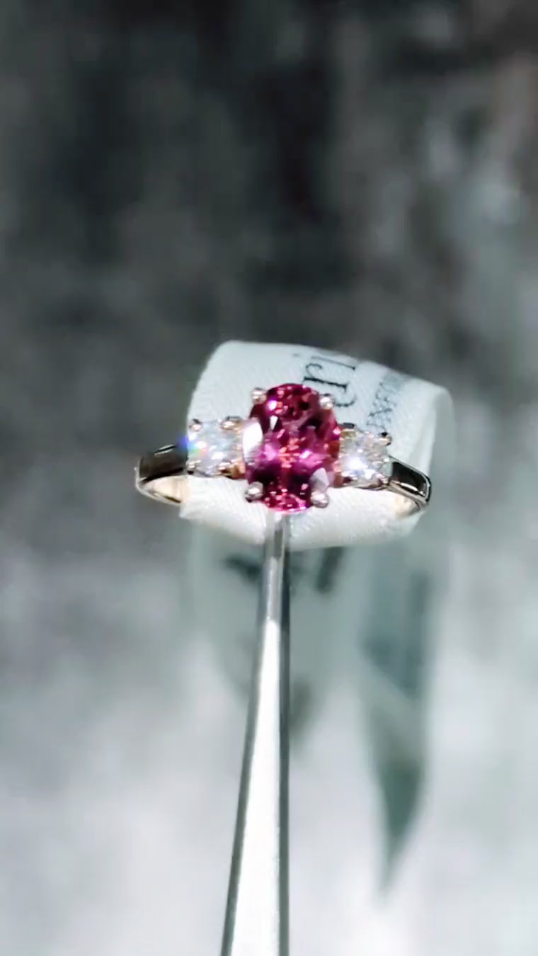 Fuchsia pink oval cut tourmaline and diamond ring