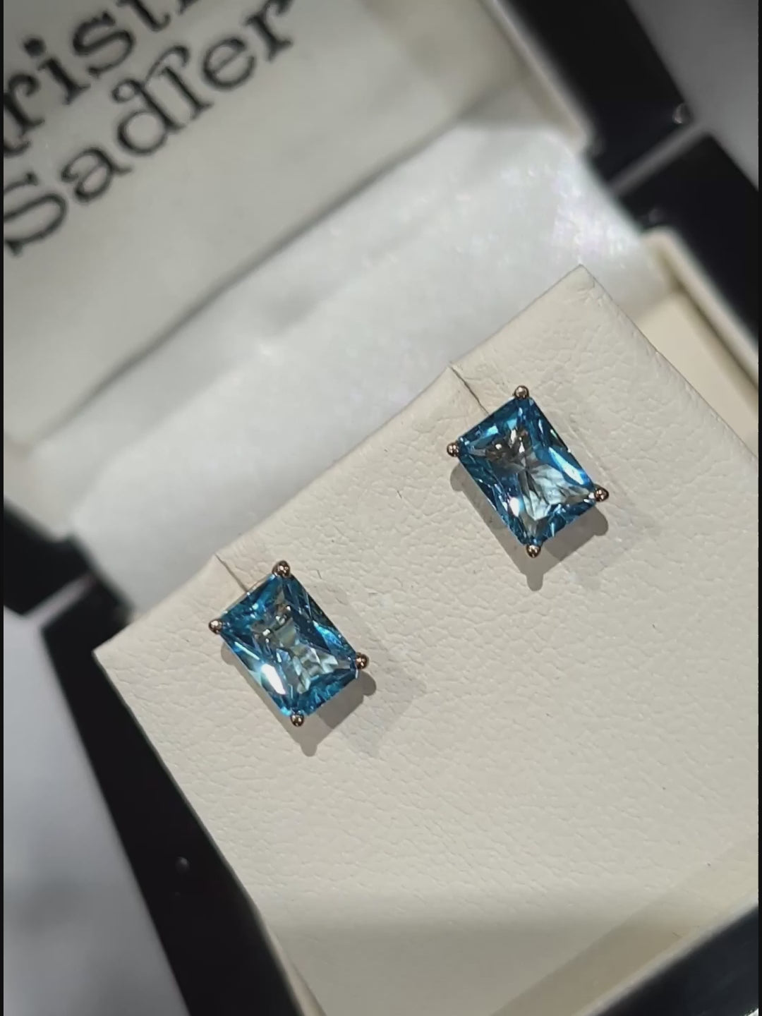 Recangular swiss blue topaz earrings in 9ct yellow gold