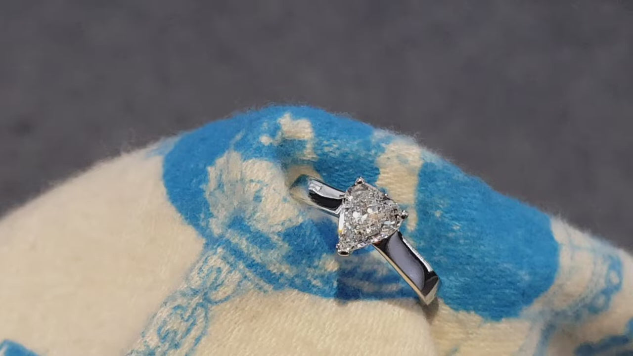unique diamond engagement ring set with a single rare briolette diamond in the shape of an arrow tip - Christine Sadler