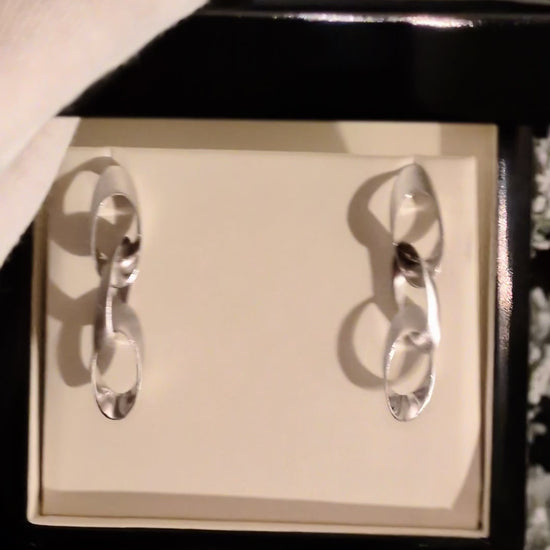 special and different designer silver drop earrings for women