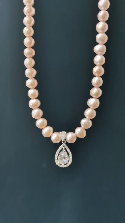17" Pink Cultured Pearl Necklace with Pear-Cut CZ Halo Pendant