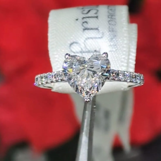 modern engagement ring with heart cut lab diamond in platinum