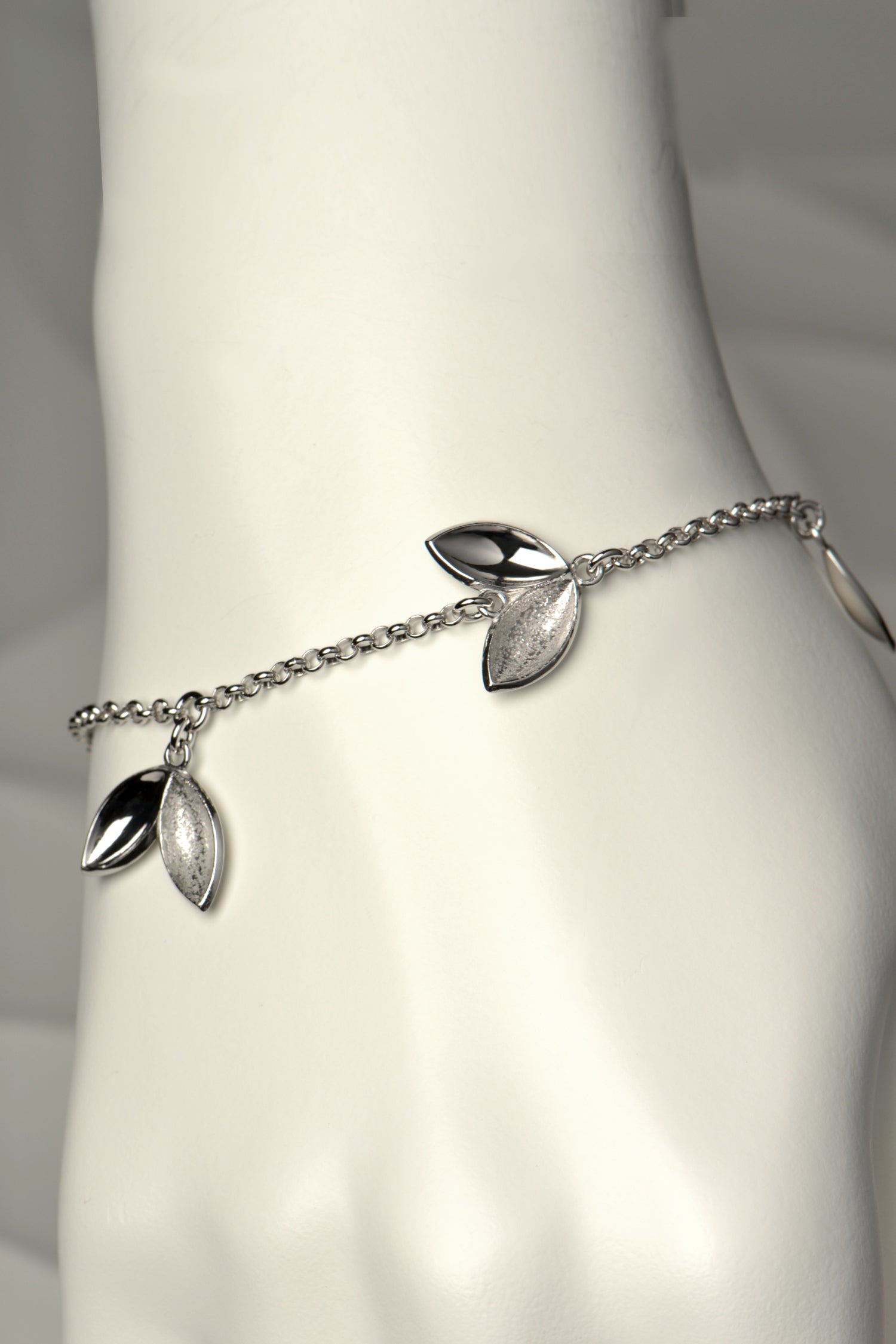 The Promise seed charm bracelet is modern and special. For each one sold, a tree is planted in Scotland
