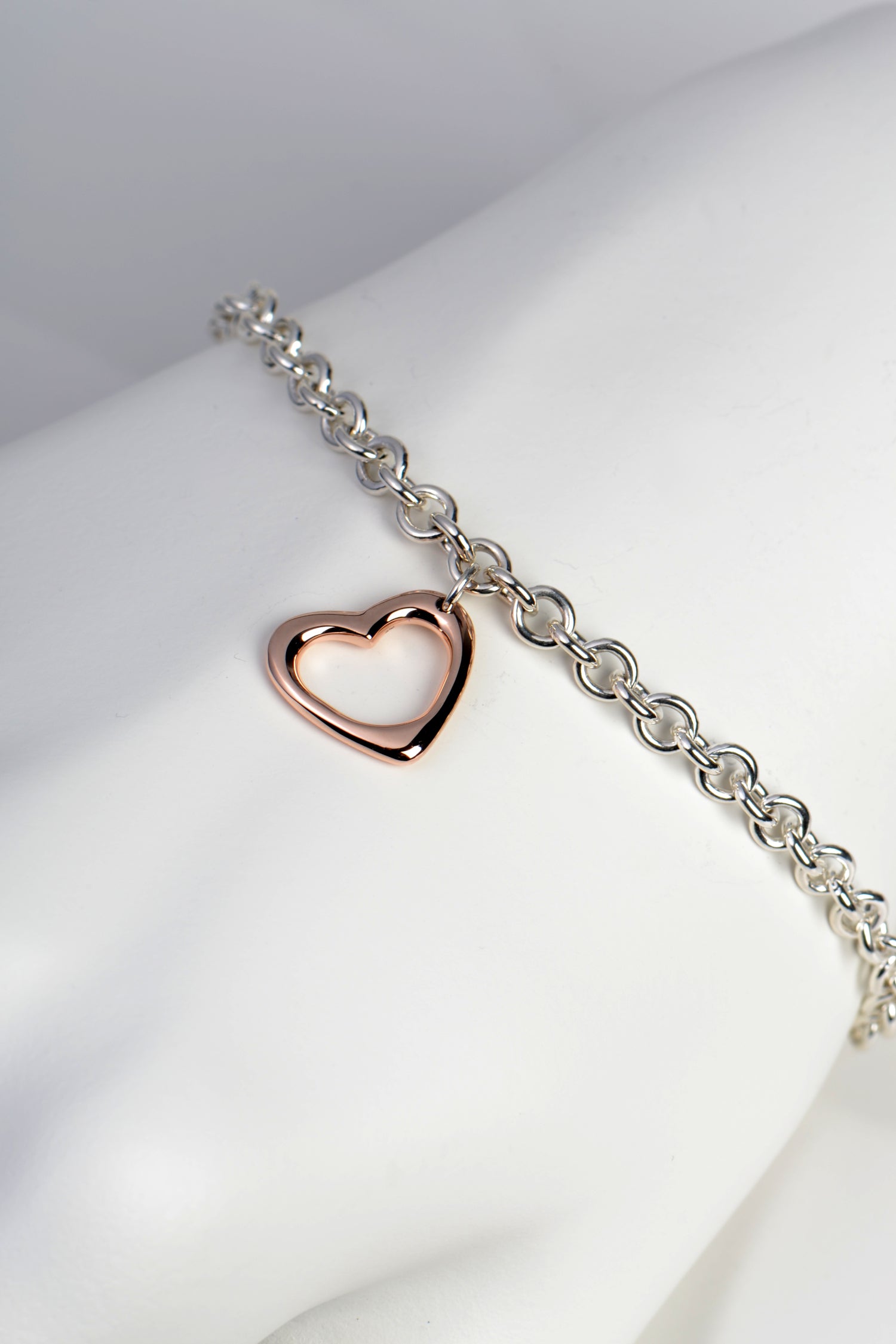 rose gold heart on silver bracelet