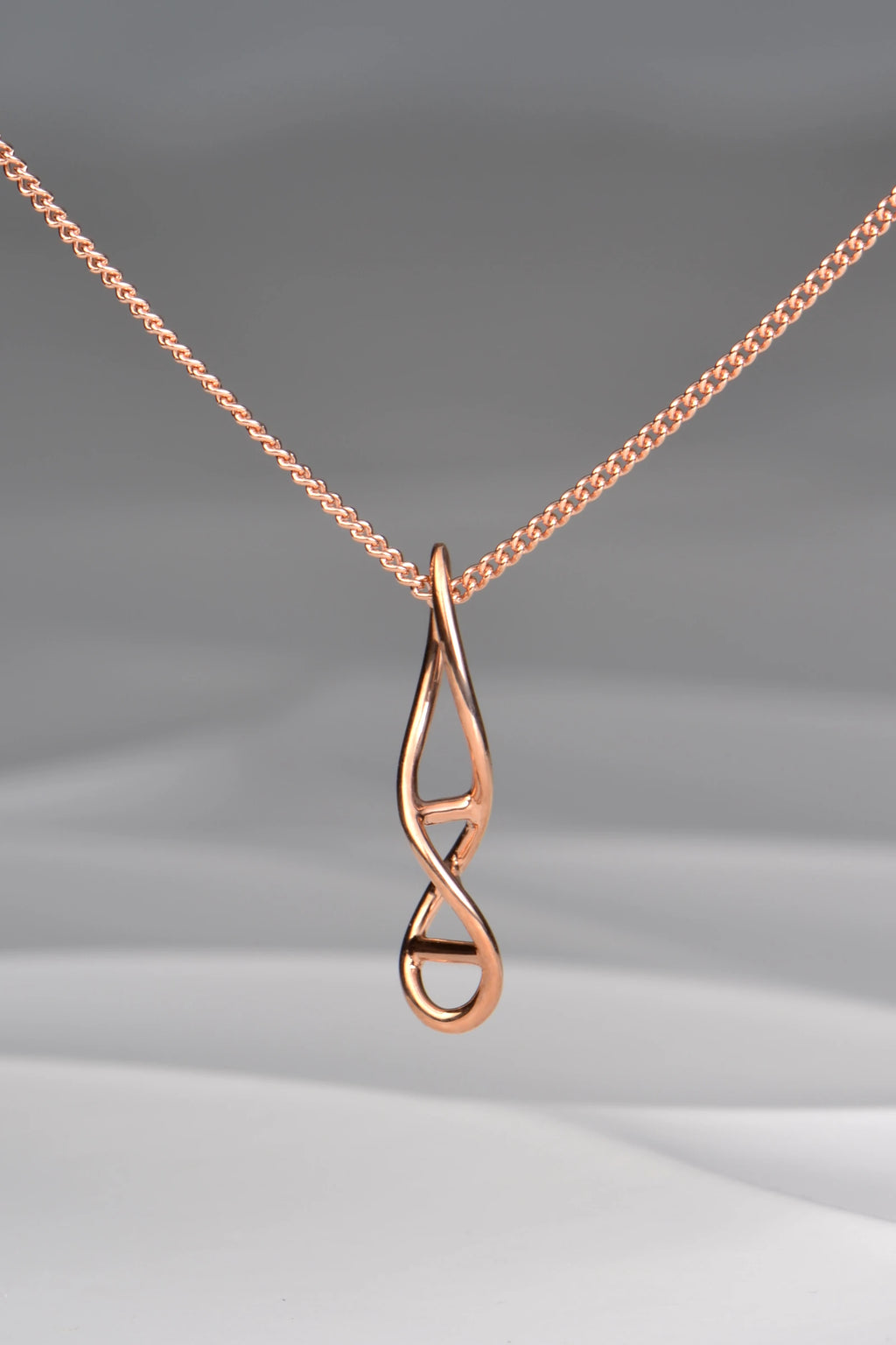 handcrafted 9ct rose gold DNA twist necklace from jewellery designer Christine Sadler