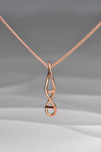 handcrafted 9ct rose gold DNA twist necklace from jewellery designer Christine Sadler