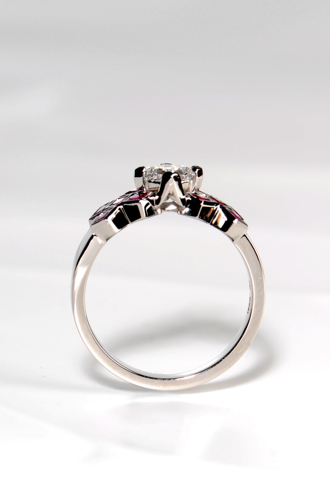 scottish tartan engagement ring in platinum with rubies and diamonds by scottish jewellery designer Christine Sadler