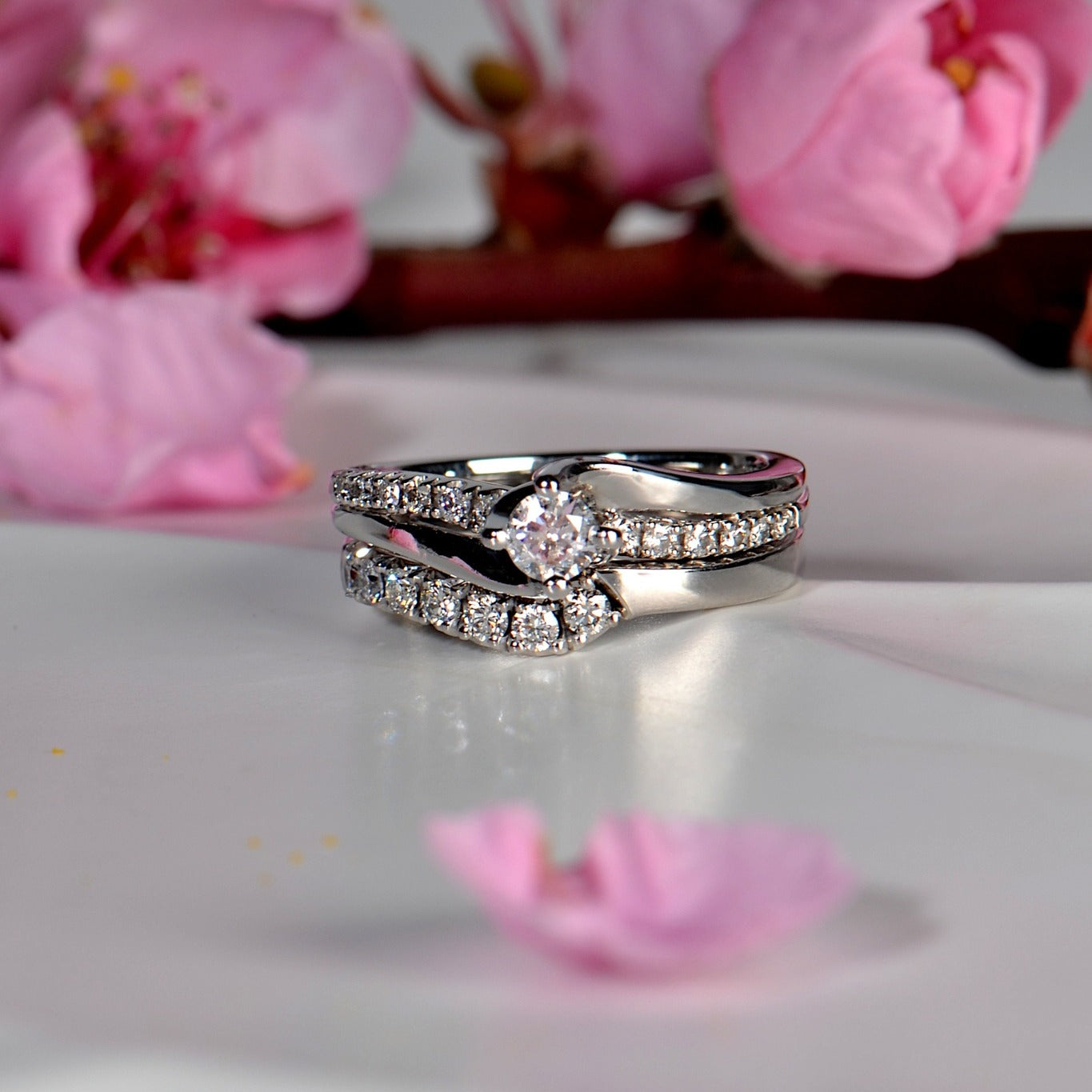 shaped wedding ring in white gold with diamonds with the matching engagement ring, custom made from Christine Sadler