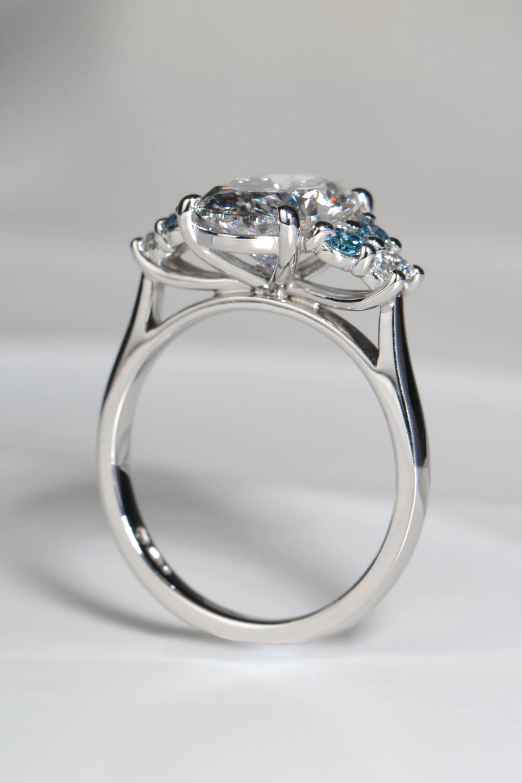 Side profile of the Blue Sky Spark platinum ring showing the setting and shank detail