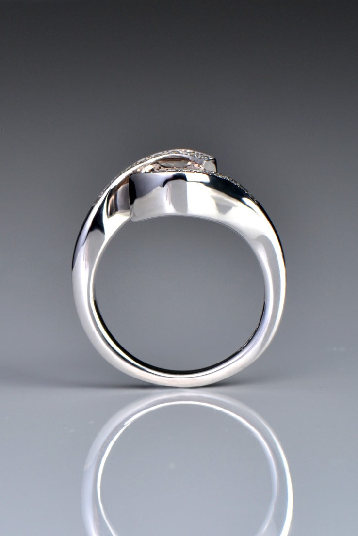 side view of the platinum morganite and diamond engagement ring showing the height of the ring at the top tapering towards the back - Christine Sadler