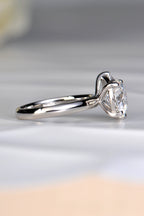 Side profile view of a 3.05ct round brilliant lab diamond in a raised platinum setting showing how a wedding band fits flush by Christine Sadler