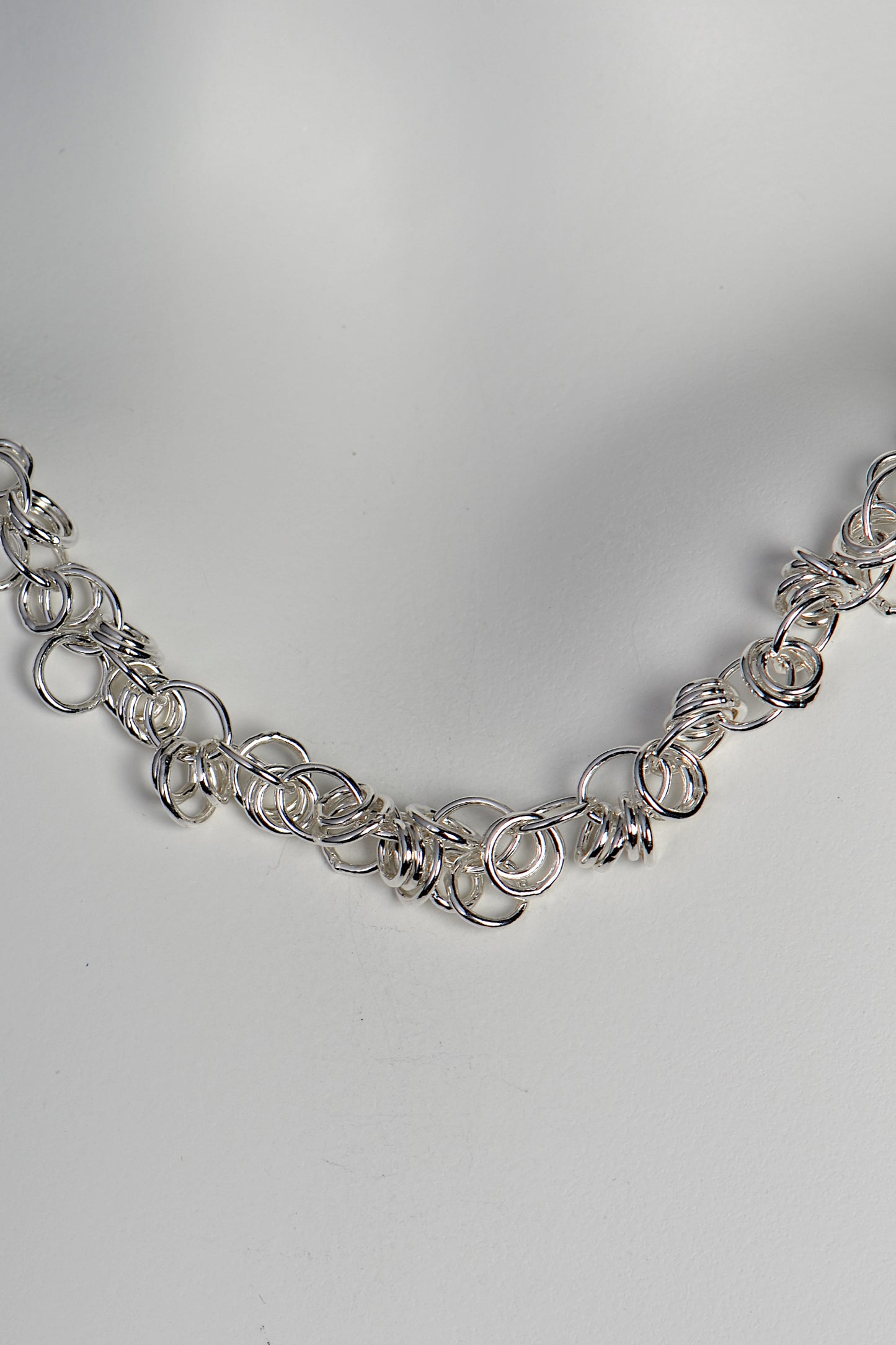 close up detail showing the round and oval links of the sterling silver chain necklace