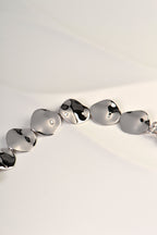 modern silver bracelet inspired by water rippling