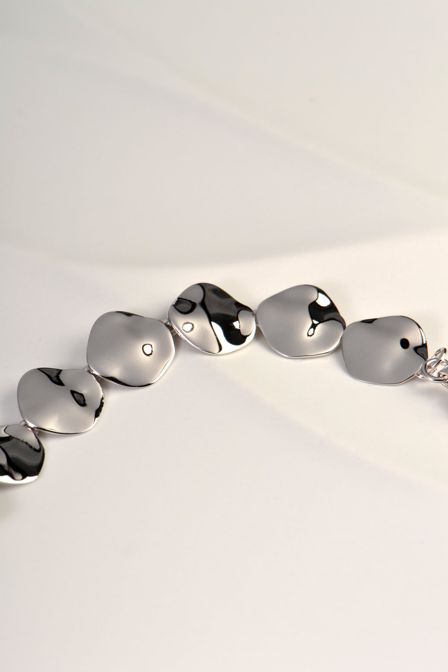 modern silver bracelet inspired by water rippling