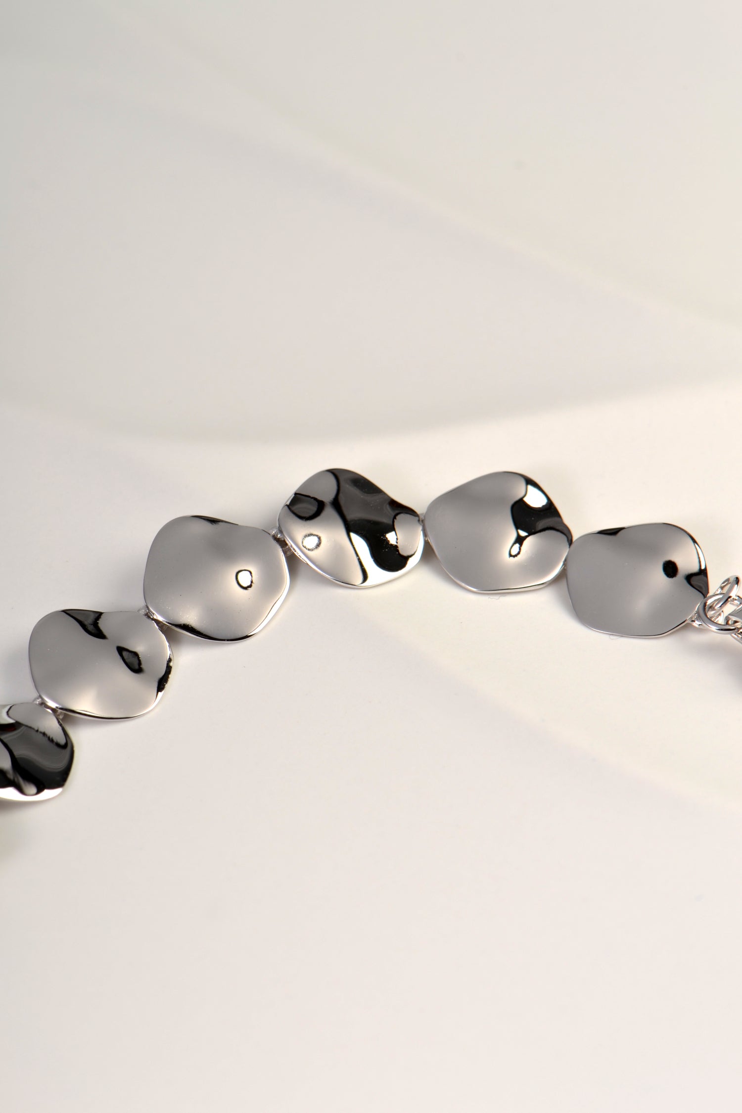 modern silver bracelet inspired by water rippling