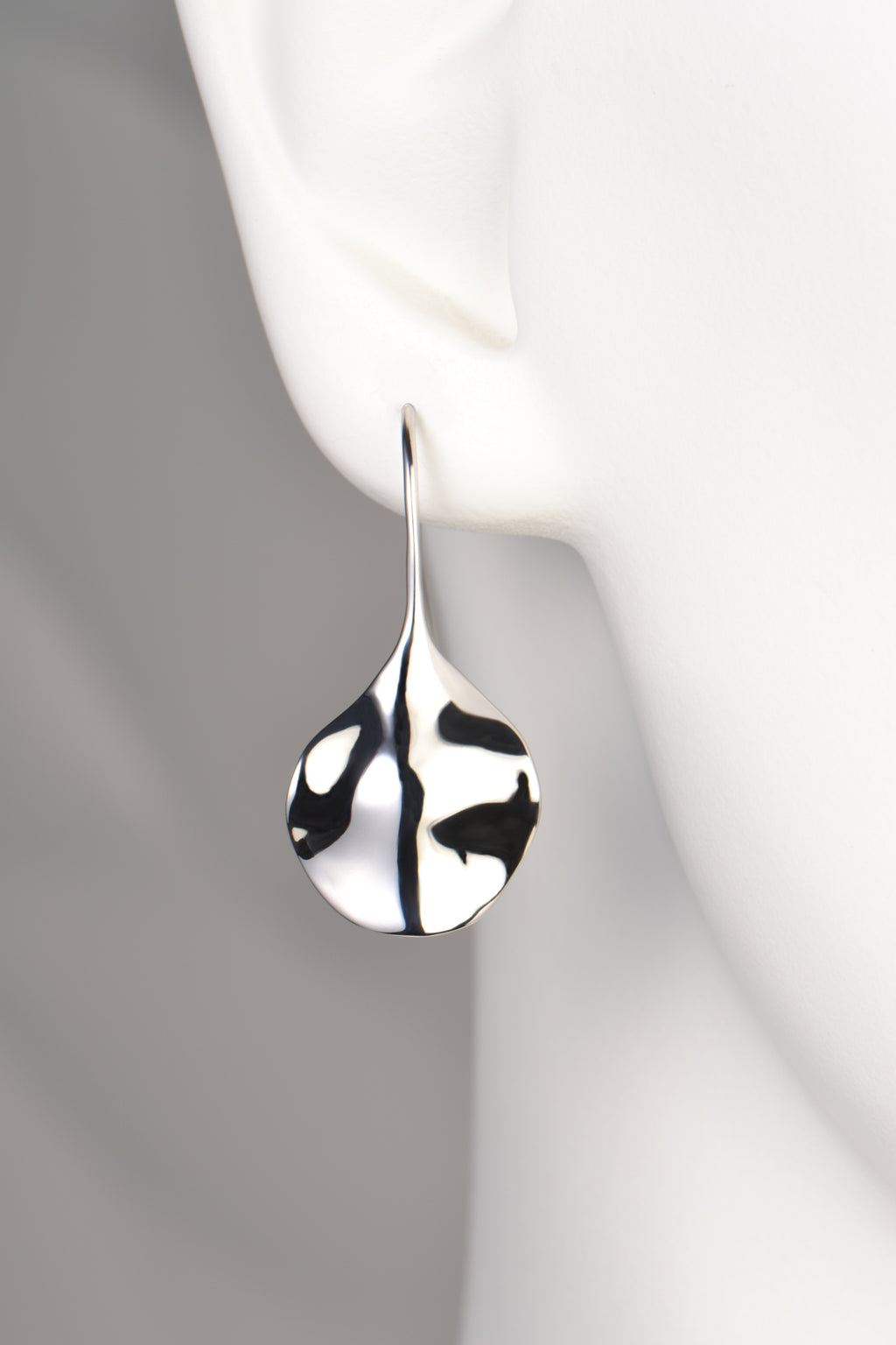 modern silver designer drop earrings that are different and special. 