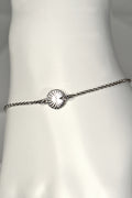 modern silver talisman bracelet that empowers the wearer to feel that they are enough, just as they are from jewellery designer Christine Sadler