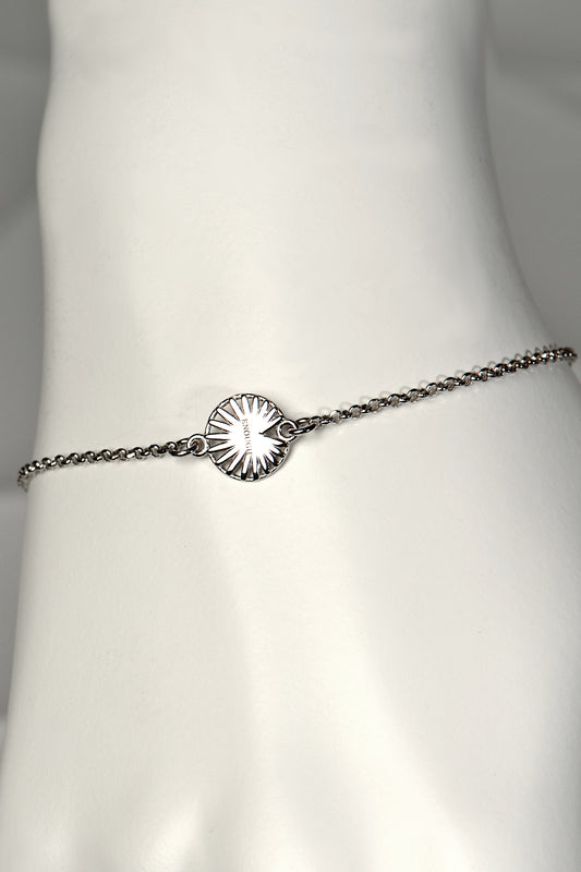 modern silver talisman bracelet that empowers the wearer to feel that they are enough, just as they are from jewellery designer Christine Sadler